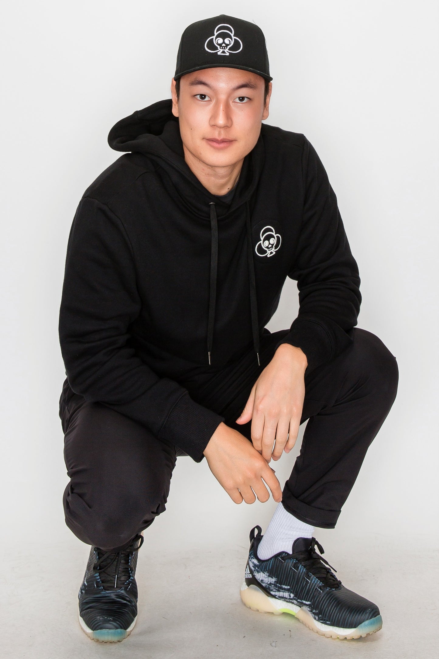 Asian model with CS hoodie and cap